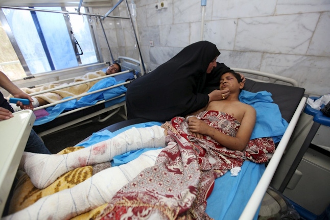 A boy injured in the blast is visited by his mother in the days after the attack.